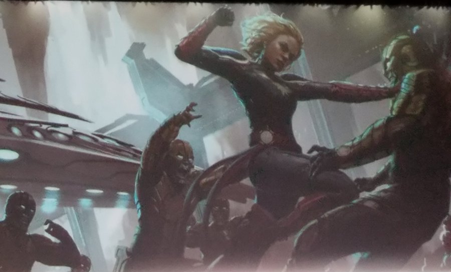 Capitã Marvel - Artwork Oficial - Heroína enfrentando inimigos